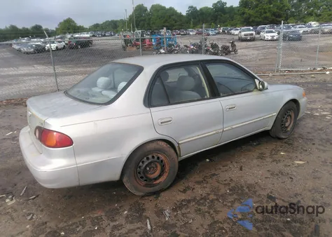 2001 Toyota Corolla Le z USA, uszkodzony, nr VIN 1NXBR12EX1Z556447